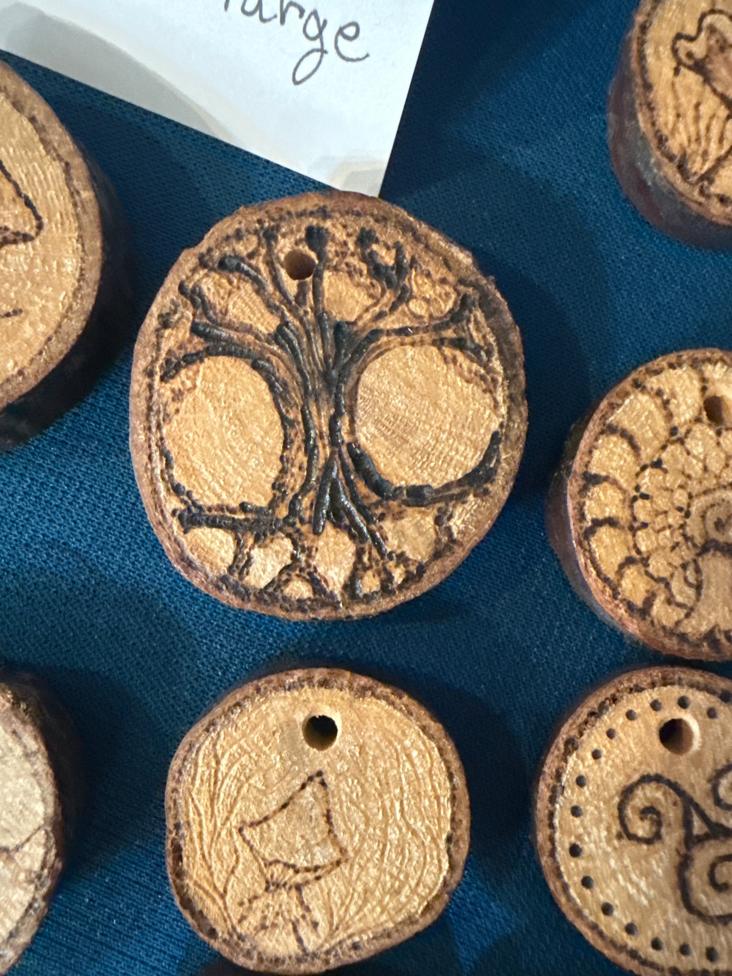 Wood burns pendants